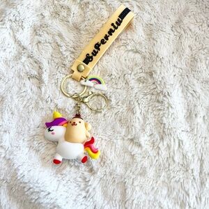 Sanrio Poppompurin on a Unicorn Keychain Wristlet Bag Charm